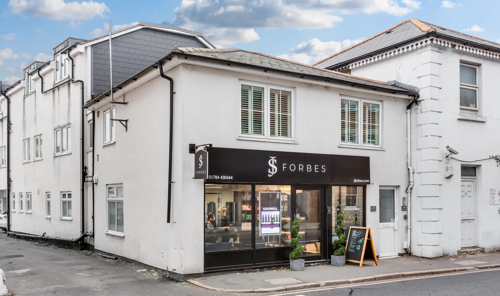 Exterior view of Station Road Flat 52a building on Egham high street